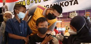 Polres Pekalongan Kota Gelar Gebyar Vaksin Covid-19 Untuk Anak Yatim Piatu Usia 6-11 Tahun Dan Baksos